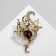Brooch "Flower" melting, white-bearded color in gold