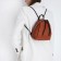 Women's backpack-Mini of artificial leather with lightning, brown color