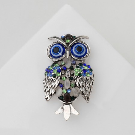 Owl brooch, color in black silver