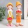 Souvenir Polystone "Boy/Girl with fruit basket" MIX 6x6x20 cm