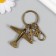 Trick Metal with carbine "Aircraft" bronze 7.5 cm