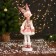 New Year's jester "in a dress with sequins and fur" 30 cm, pink-white