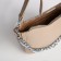 Bag Women's Cross-Bodi with a zipper, beige color