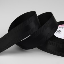 The tape is decorative, repression/satin, 25 mm, 18 ± 1 m, black color