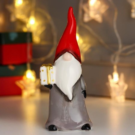 Souvenir Ceramics "Santa Claus, gray caftan, red cap, with a gift" 16.5x6x6.5 cm