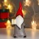 Souvenir Ceramics "Santa Claus, gray caftan, red cap, with a gift" 16.5x6x6.5 cm