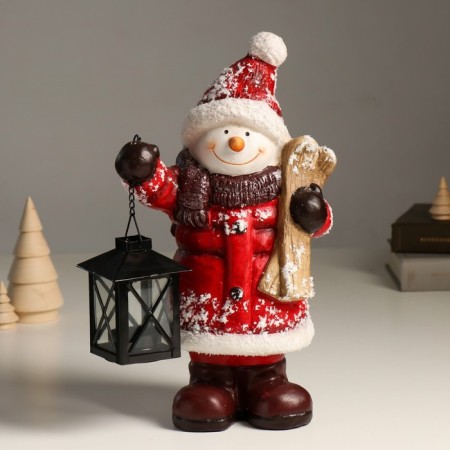 Ceramics Snowman "Snowman in a red fur coat, with a lantern and skiing" 21.5x12x31 cm