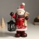 Ceramics Snowman "Snowman in a red fur coat, with a lantern and skiing" 21.5x12x31 cm
