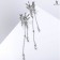 Hanging earrings with rhinestones "Firebird" drops and beads on a chain, white color in silver, 11 cm