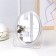 The mirror of the desktop "oval", a bilateral, mirror surface is 11 × 14 cm, the color is transparent