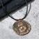Unisex "Coin" with a skull, color black gold on a black lace, 45 cm