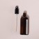 A bottle for storage, with a spray, 100 ml, brown/black color