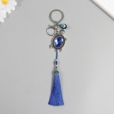 A keychain with a carbine from the evil eye Metal 