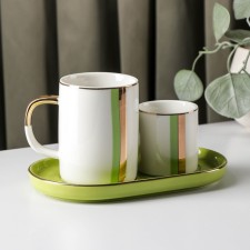 A set of mugs on the ceramic stand 