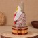 Brown Domovka "Athanasius with a bag", on a barrel, 28x15x12 cm