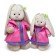 Soft toy "Bunny Mi", in an eco -leather coat, 25 cm
