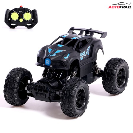 The radio -controlled “conqueror” jeep, control from the phone, works for the battery, the color is black