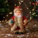 Santa Claus "In a patterned fur coat with a Christmas tree" 19 cm, brown-red