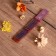 Karma 10 sticks with a wooden strawberry stand