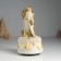 Souvenir Polystone Music "Santa Claus in a brown fur coat with a Christmas tree" 10x10x18 cm