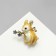 Brooch "Rabbit" with flowers, colored in gold