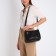 Female bag on one shoulder, on a zipper, black color