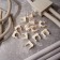 Fastener-clip for the mounting gun Ø 25 mm, white (50 pcs/UP) rexant