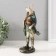 Souvenir Polystone "Dog in armor with a raincoat" 11.5x10x27 cm