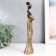 Souvenir Polystone "African with a jug in the patterned outfit" mix 7.3x5x29 cm