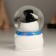 Souvenir Polystone Water Ball Light "Snowman with a Christmas tree in the helmet-bunch" 6.5x6.7x9.5 cm