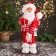 Santa Claus "in a striped scarf and with a flashlight" 44 cm, white-red