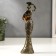 Souvenir Polystone "African with a jug, in an outfit with mirror mosaics" MIX 26x7x5 cm