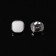 A button on the leg, d = 10 mm, the color is white/silver