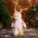 Soft toy "Snowman in a suit with flowers" costs, 13x27 cm, pink