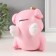 The piggy bank "Pig Princess" height is 14 cm, width 12 cm, length 15 cm.