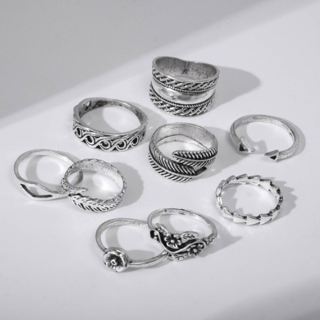 A set of rings 9 pieces of “Assorted” leaves, patterns, size mix, color black silver-1