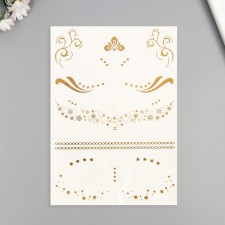 Tattoo on the body Gold 