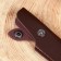 The scabbard is a leather knife cover, under a blade up to 10 x 3 cm, dark brown