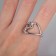 The ring was “minimal” the heart, the color is silver, dimensionless
