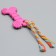 Chewing toy with a rope "bone with a tail", pink