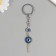 Keychain from the evil eye metal "Key of luck" 2x7 cm