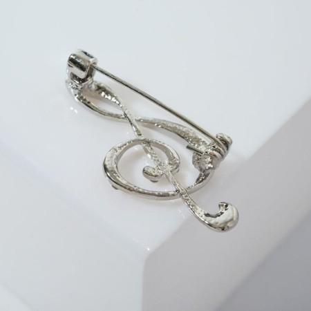 Brooch "Violin key" radiance, white color in silver-1