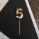 Candle for the cake, number "5", champagne.