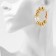 Ground-shaft earrings “environment” of clusters, color gold, d = 5.7