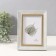 Photo frame plastic 10x15 cm "Violett" light gray with a gold stripe 1.5x14.4x19.4 cm