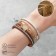 Bracelet "On the Magnet" Naichural, white-beige color in gold, 19.5 cm