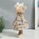 Interior doll "Baby with a bow in hair, with a flower" 35x13.5x20 cm