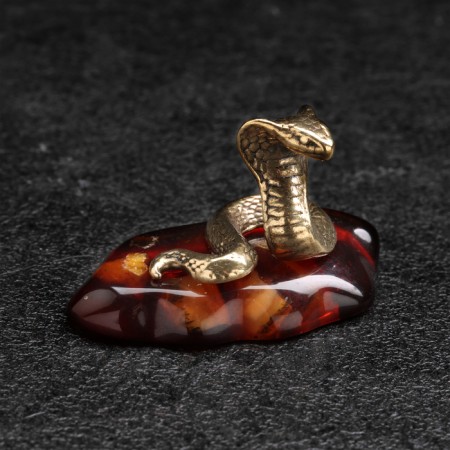 Souvenir "Snake of Cobra", small, brass, amber