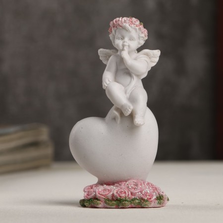 Polystone souvenir "Snowty Angel in a pink veneer on the heart" 8.5x4.3x2.2 cm