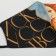A fabric mask with adjusting ties, protective "art"